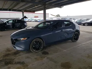 2024 Mazda 3 S Carbon Edition with VIN JM1BPBLM5R1701011, listed as a Copart auction lot 47946365 with 27,132 mi miles and Salvage Title. Bid and sale history available at DreamBid. Image 1.