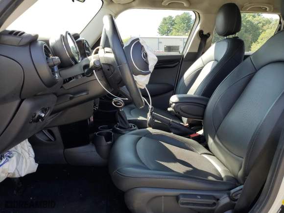 2019 MINI Hardtop 4 Door Cooper with VIN WMWXU1C56K2H74308, listed as a Copart auction lot 73110974 with 76,307 mi miles and Salvage Title. Bid and sale history available at carsss.com. Image 7.