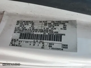 2002 Ford Econoline Wagon XL with VIN 1FBSS31L72HB03115, listed as a Copart auction lot 68837454 with 192,515 mi miles and Salvage Title. Bid and sale history available at carsss.com. Image 14.