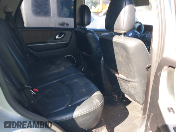 2006 Mercury Mariner Luxury with VIN 4M2YU56106DJ09607, listed as a IAAI auction lot 41931293 with 249,346 mi miles and . Bid and sale history available at DreamBid. Image 8.