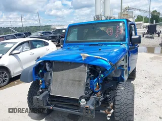 2016 Jeep Wrangler Black Bear with VIN 1C4AJWAG4GL176980, listed as a IAAI auction lot 42744445 with 58,011 mi miles and . Bid and sale history available at DreamBid. Image 12.