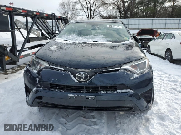 2018 Toyota RAV4 LE with VIN JTMBFREVXJJ256304, listed as a Copart auction lot 87203754 with Not Provided miles and Salvage Title. Bid and sale history available at carsss.com. Image 5.
