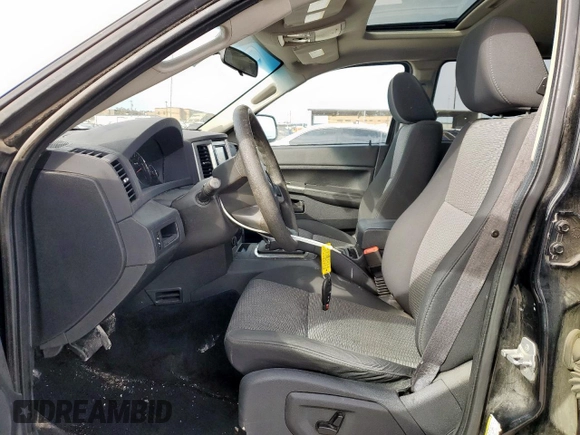 2008 Jeep Grand Cherokee with VIN 1J8HS48N28C182467, listed as a Copart auction lot 47081165 with 143,936 mi miles and Salvage title. Bid and sale history available at DreamBid. Image 7.