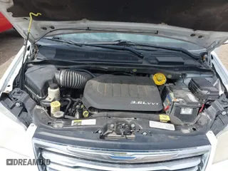 2014 Chrysler Town & Country Touring with VIN 2C4RC1BG4ER404320, listed as a IAAI auction lot 42075325 with 233,018 mi miles. Bid and sale history available at carsss.com. Image 10.