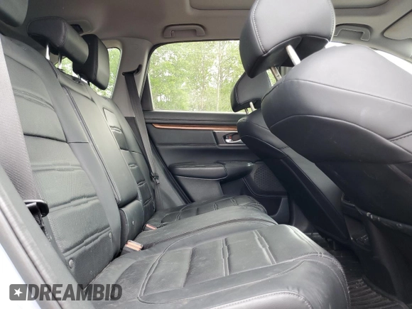 2020 Honda CR-V Touring z VIN 2HKRW2H9XLH236764, wystawiony jako Copart lot #59693475 z przebiegiem Nie podano mil oraz Czysty tytuł • Clean title. Historia ofert i sprzedaży dostępna na DreamBid. Obrazek 11.