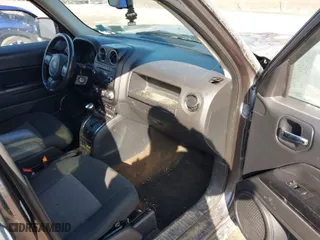 2014 Jeep Patriot Latitude with VIN 1C4NJRFB7ED892604, listed as a IAAI auction lot 41800290 with 111,440 mi miles. Bid and sale history available at carsss.com. Image 5.