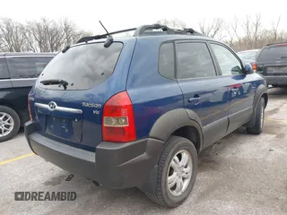 2006 Hyundai Tucson GLS with VIN KM8JN12D26U294624, listed as a IAAI auction lot 41853785 with 217,113 mi miles. Bid and sale history available at carsss.com. Image 4.