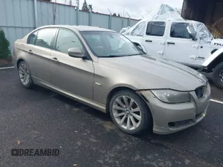2011 BMW 3 Series 328i with VIN WBAPH5C57BA443932, listed as a IAAI auction lot 40832127 with 206,426 mi miles and . Bid and sale history available at carsss.com. Image 1.