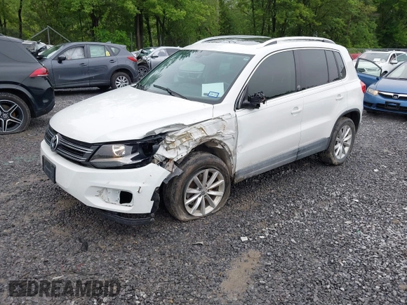 2017 Volkswagen Tiguan Wolfsburg Edition with VIN WVGRV7AX9HK002659, listed as a IAAI auction lot 42482438 with 88,841 mi miles and . Bid and sale history available at DreamBid. Image 17.