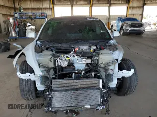 2020 Tesla Model 3 Standard Range Plus with VIN 5YJ3E1EA6LF645215, listed as a Copart auction lot 47882375 with 69,317 mi miles and Salvage Title. Bid and sale history available at DreamBid. Image 5.