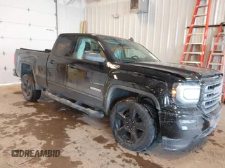 2018 GMC Sierra 1500 SLE z VIN 1GTV2MEC5JZ323550, wystawiony jako IAAI lot #41468804 z przebiegiem 85 389 mil mil oraz . Historia ofert i sprzedaży dostępna na DreamBid. Obrazek 1.