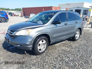 2010 Honda CR-V LX with VIN JHLRE4H33AC002519, listed as a IAAI auction lot 42577053 with 290,435 mi miles and . Bid and sale history available at DreamBid. Image 2.