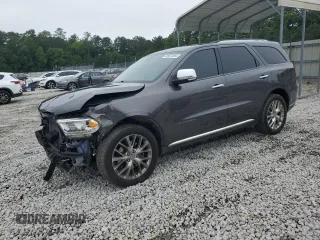 2014 Dodge Durango Citadel with VIN 1C4SDJET9EC435191, listed as a Copart auction lot 58572665 with 168,478 mi miles and Salvage title. Bid and sale history available at DreamBid. Image 1.