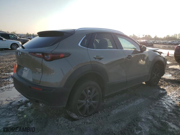 2024 Mazda CX-30 2.5 Carbon Turbo with VIN 3MVDMBXY0RM711655, listed as a Copart auction lot 84243674 with 1,262 mi miles and Salvage Title. Bid and sale history available at carsss.com. Image 3.