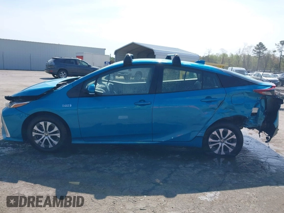 2021 Toyota Prius LE with VIN JTDKAMFP7M3180504, listed as a IAAI auction lot 41985409 with 56,617 mi miles and . Bid and sale history available at DreamBid. Image 14.