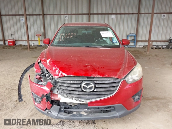 2016 Mazda CX-5 Touring with VIN JM3KE2CY0G0691927, listed as a IAAI auction lot 41611743 with 160,246 mi miles. Bid and sale history available at carsss.com. Image 12.
