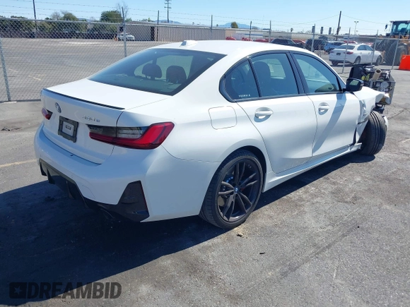 2023 BMW 3 Series 330e with VIN 3MW39FF02P8C89795, listed as a IAAI auction lot 41648172 with 27,179 mi miles. Bid and sale history available at carsss.com. Image 4.