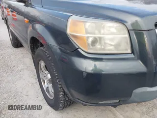 2006 Honda Pilot EX-L with VIN 2HKYF18746H558986, listed as a IAAI auction lot 41875118 with 207,058 mi miles and . Bid and sale history available at DreamBid. Image 6.