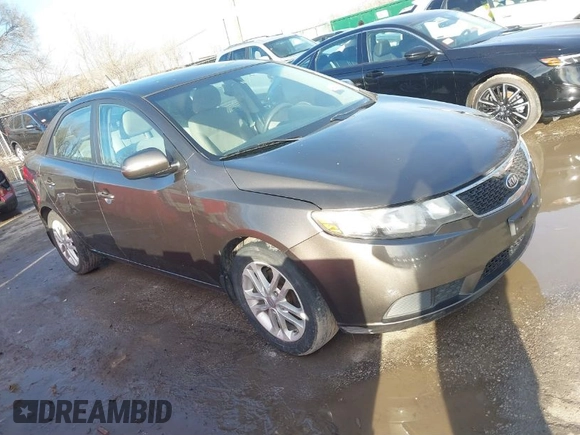 2012 Kia Forte EX with VIN KNAFU4A27C5476031, listed as a IAAI auction lot 41633058 with 137,998 mi miles. Bid and sale history available at carsss.com. Image 1.