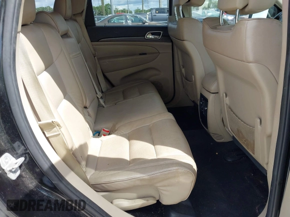 2014 Jeep Grand Cherokee Laredo with VIN 1C4RJEAG6EC136832, listed as a IAAI auction lot 42258348 with 151,647 mi miles and . Bid and sale history available at DreamBid. Image 8.