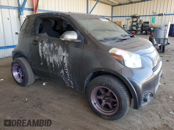 2012 Scion iQ z VIN JTNJJXB09CJ012794, wystawiony jako Copart lot #52983435 z przebiegiem 135 927 mil mil oraz Szkoda całkowita • Salvage title. Historia ofert i sprzedaży dostępna na DreamBid. Obrazek 4.