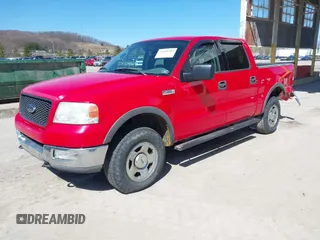 2004 Ford F-150 XLT with VIN 1FTRW14W04KC99493, listed as a IAAI auction lot 41858784 with 165,284 mi miles. Bid and sale history available at carsss.com. Image 2.
