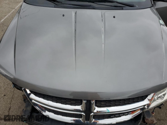 2012 Dodge Journey Crew with VIN 3C4PDDDG6CT275610, listed as a Copart auction lot 57063865 with 126,319 mi miles and Salvage title. Bid and sale history available at DreamBid. Image 12.