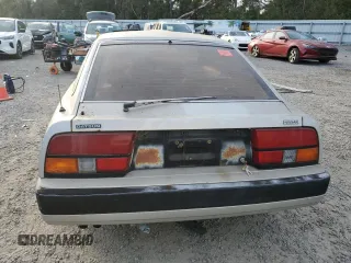 1984 Nissan 300ZX z VIN JN1HZ16S5EX016042, wystawiony jako Copart lot #86071904 z przebiegiem Nie podano mil oraz Szkoda całkowita • Salvage title. Historia ofert i sprzedaży dostępna na DreamBid. Obrazek 6.