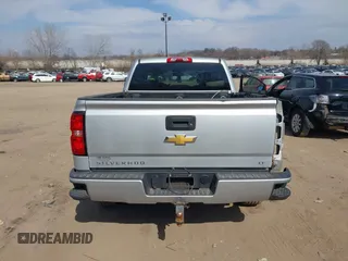 2016 Chevrolet Silverado 1500 LT with VIN 1GCVKREC4GZ125676, listed as a IAAI auction lot 42006237 with 114,699 mi miles. Bid and sale history available at carsss.com. Image 16.