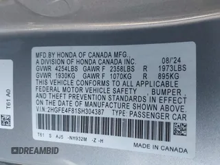 2025 Honda Civic Sedan Hybrid Sport with VIN 2HGFE4F81SH304387, listed as a IAAI auction lot 41558209 with 8,074 mi miles. Bid and sale history available at carsss.com. Image 9.