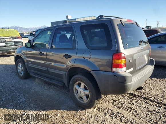 2002 Ford Escape XLS Choice with VIN 1FMYU021X2KC77142, listed as a Copart auction lot 77036384 with 213,292 mi miles and Clean title. Bid and sale history available at DreamBid. Image 2.