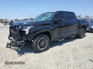2025 Toyota Tundra SR with VIN 5TFLA5DB3SX258011, listed as a Copart auction lot 57523325 with 8,651 mi miles and Salvage title. Bid and sale history available at DreamBid. Image 1.