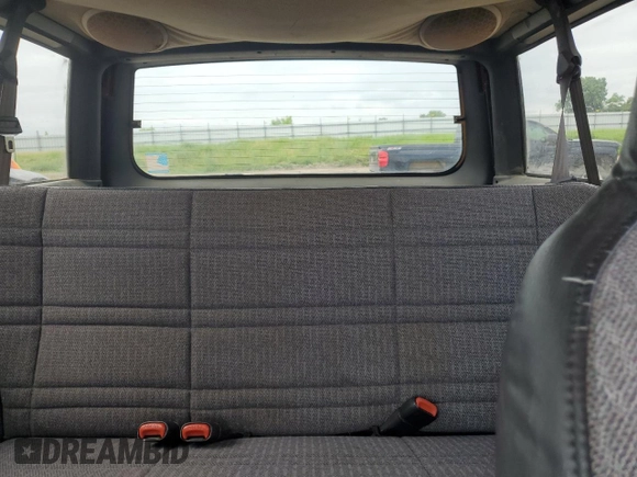 1999 Jeep Cherokee Sport with VIN 1J4FF68S4XL580048, listed as a Copart auction lot 62546365 with 154,059 mi miles and Clean title. Bid and sale history available at DreamBid. Image 10.