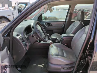 2006 Ford Escape Hybrid with VIN 1FMCU96H06KA75275, listed as a Copart auction lot 48596425 with 216,379 mi miles and Salvage title. Bid and sale history available at DreamBid. Image 7.