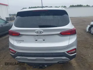 2019 Hyundai Santa Fe SE z VIN 5NMS23AD4KH130517, wystawiony jako IAAI lot #42324854 z przebiegiem 76 963 mil mil oraz . Historia ofert i sprzedaży dostępna na DreamBid. Obrazek 16.