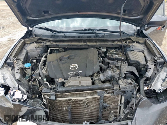 2014 Mazda CX-5 Touring z VIN JM3KE2CY7E0308580, wystawiony jako Copart lot #60565835 z przebiegiem 92 708 mil mil oraz Szkoda całkowita • Salvage title. Historia ofert i sprzedaży dostępna na DreamBid. Obrazek 12.