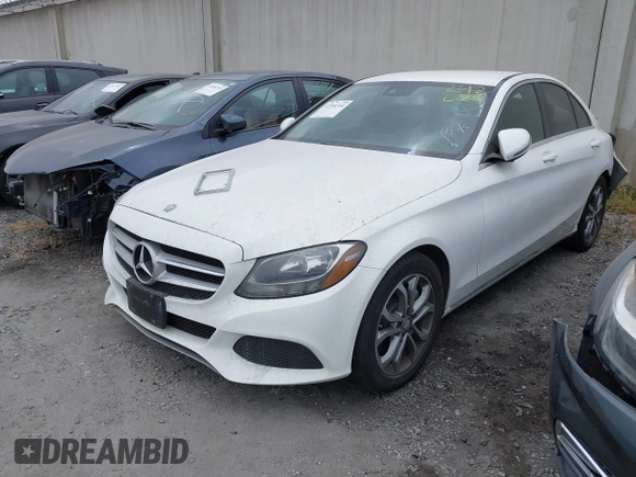 2017 Mercedes-Benz C 300 with VIN 55SWF4JB2HU205606, listed as a IAAI auction lot 42204344 with 88,162 mi miles and . Bid and sale history available at DreamBid. Image 2.