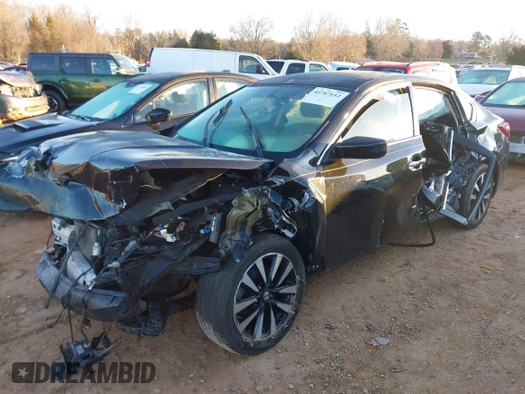 2018 Nissan Altima 2.5 S with VIN 1N4AL3AP7JC196940, listed as a IAAI auction lot 41767112 with 124,736 mi miles. Bid and sale history available at carsss.com. Image 2.