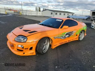 1993 Toyota Supra z VIN JZA800013665, wystawiony jako Copart lot #81811364 z przebiegiem 150 933 mil mil oraz Czysty tytuł • Clean title. Historia ofert i sprzedaży dostępna na DreamBid. Obrazek 1.