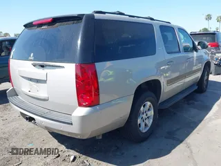 2007 GMC Yukon XL SLT with VIN 1GKFC16077R187116, listed as a IAAI auction lot 42020184 with 195,721 mi miles. Bid and sale history available at carsss.com. Image 4.