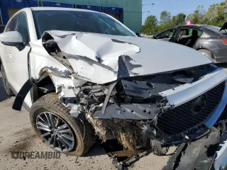 2020 Mazda CX-5 Touring with VIN JM3KFACM0L0770254, listed as a Copart auction lot 71066824 with 0 mi miles and Salvage Title. Bid and sale history available at carsss.com. Image 13.
