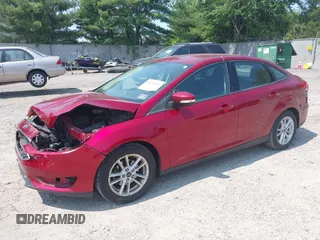 2017 Ford Focus SE z VIN 1FADP3F26HL305624, wystawiony jako IAAI lot #42411111 z przebiegiem 58 865 mil mil oraz . Historia ofert i sprzedaży dostępna na DreamBid. Obrazek 2.