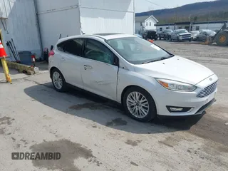 2017 Ford Focus Titanium with VIN 1FADP3N24HL331009, listed as a IAAI auction lot 42029193 with 82,068 mi miles and . Bid and sale history available at carsss.com. Image 1.
