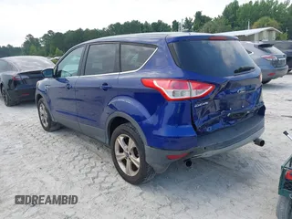 2013 Ford Escape SE with VIN 1FMCU0GX7DUD22231, listed as a IAAI auction lot 42542549 with 131,455 mi miles and . Bid and sale history available at DreamBid. Image 3.