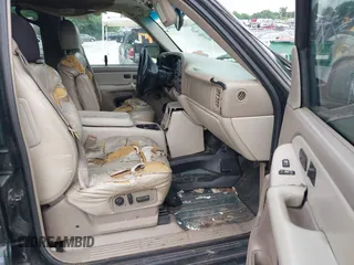 2001 Chevrolet Tahoe LT with VIN 1GNEC13T11R138465, listed as a IAAI auction lot 42447716 with Not provided miles and . Bid and sale history available at DreamBid. Image 5.