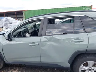 2019 Toyota RAV4 XLE with VIN JTMW1RFV7KD035614, listed as a IAAI auction lot 41970954 with 60,377 mi miles and . Bid and sale history available at DreamBid. Image 14.