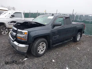 2018 Chevrolet Silverado 1500 LT with VIN 2GCVKREC6J1102304, listed as a IAAI auction lot 41800456 with 82,000 mi miles and . Bid and sale history available at DreamBid. Image 17.