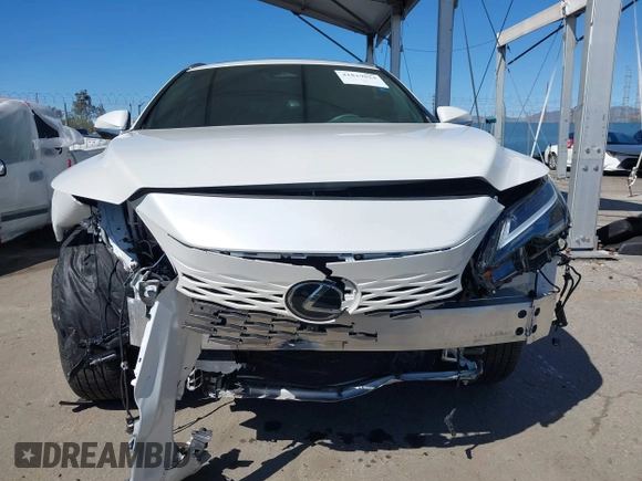 2024 Lexus RX with VIN 2T2BAMBA3RC022849, listed as a IAAI auction lot 41819024 with 8,936 mi miles. Bid and sale history available at carsss.com. Image 12.