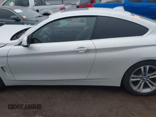 2016 BMW 4 Series 428i with VIN WBA3N7C54GK227475, listed as a IAAI auction lot 40963425 with 87,408 mi miles and . Bid and sale history available at carsss.com. Image 14.