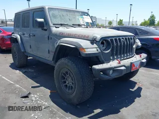 2023 Jeep Wrangler Rubicon with VIN 1C4JJXFG7PW541813, listed as a IAAI auction lot 42640045 with 53,645 mi miles and . Bid and sale history available at DreamBid. Image 12.